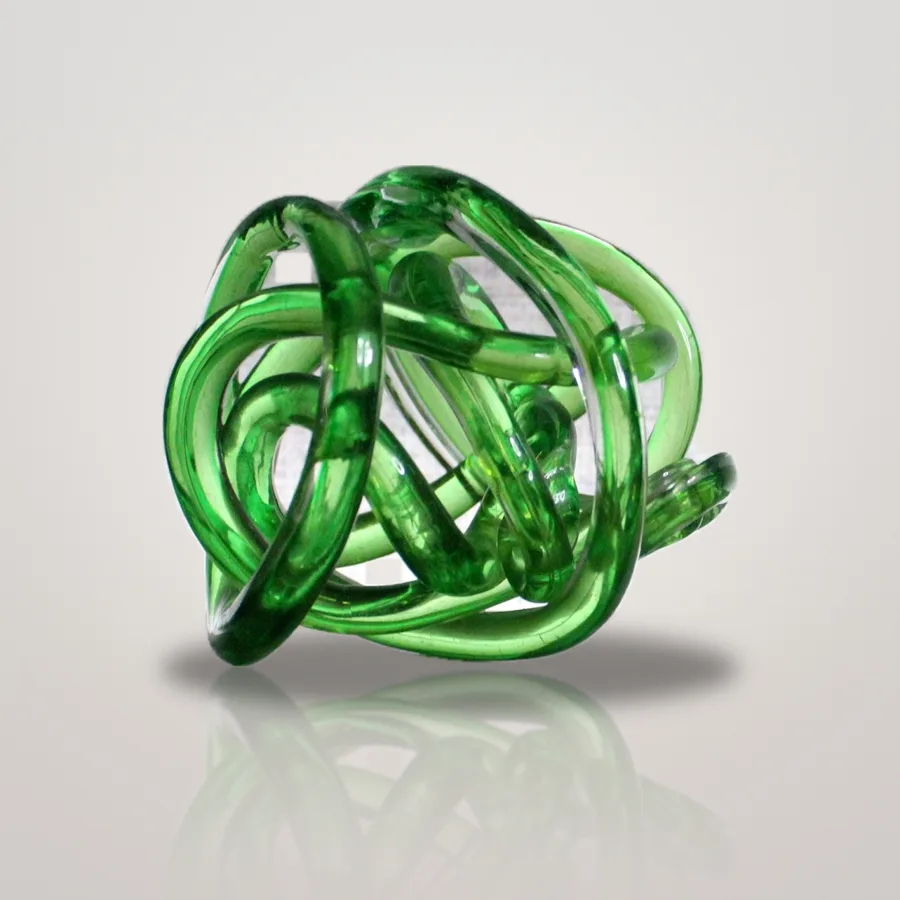 Emerald green glass love knot sculpture
